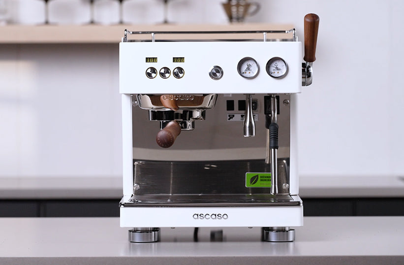 Ascaso Baby T Plus espresso machine in white on a kitchen counter - Seattle Coffee Gear