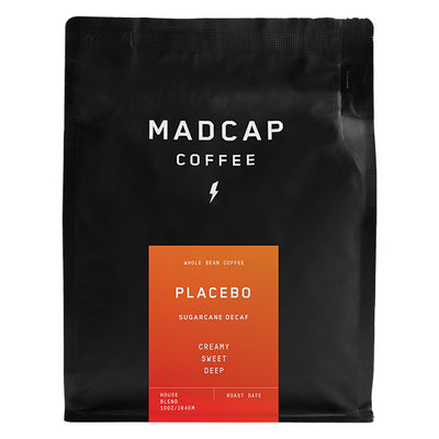 Thoughtful picture of the packaging for Madcap Coffee Placebo coffee roast.